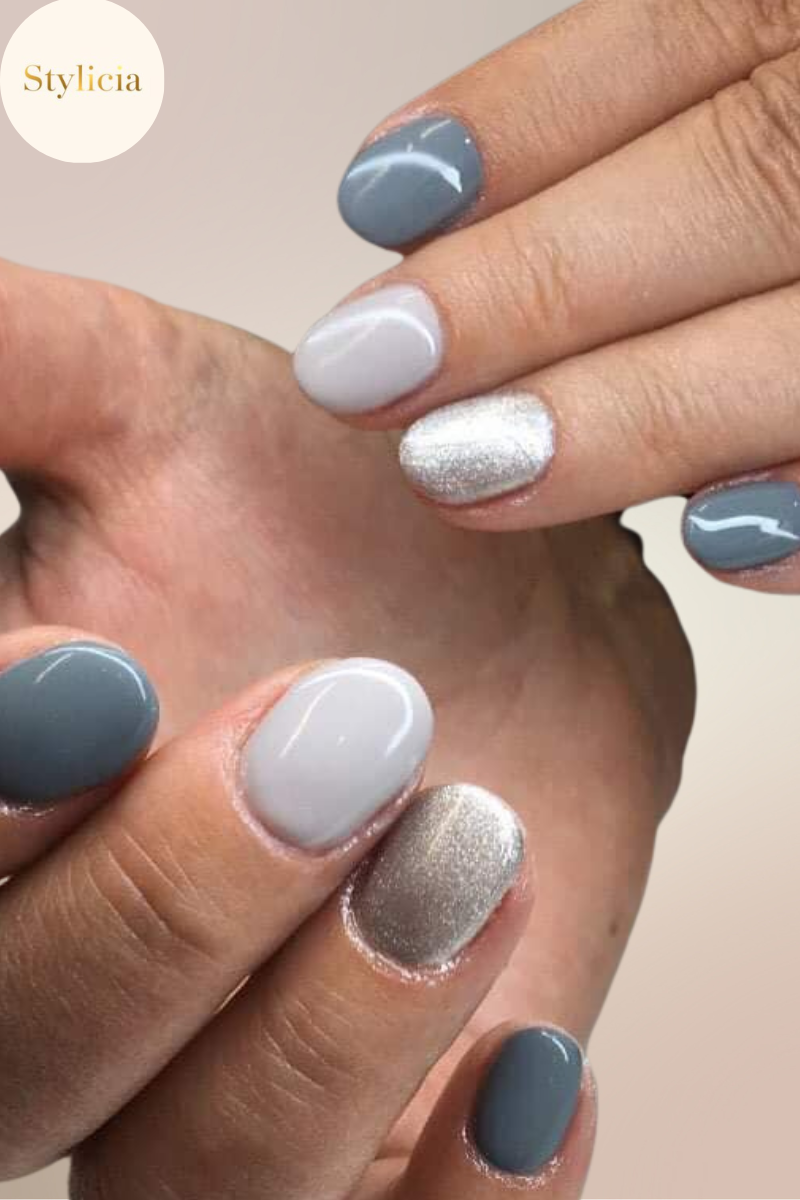 Elegant short nails with grey, silver, and nude polish – chic manicure idea for 2025.