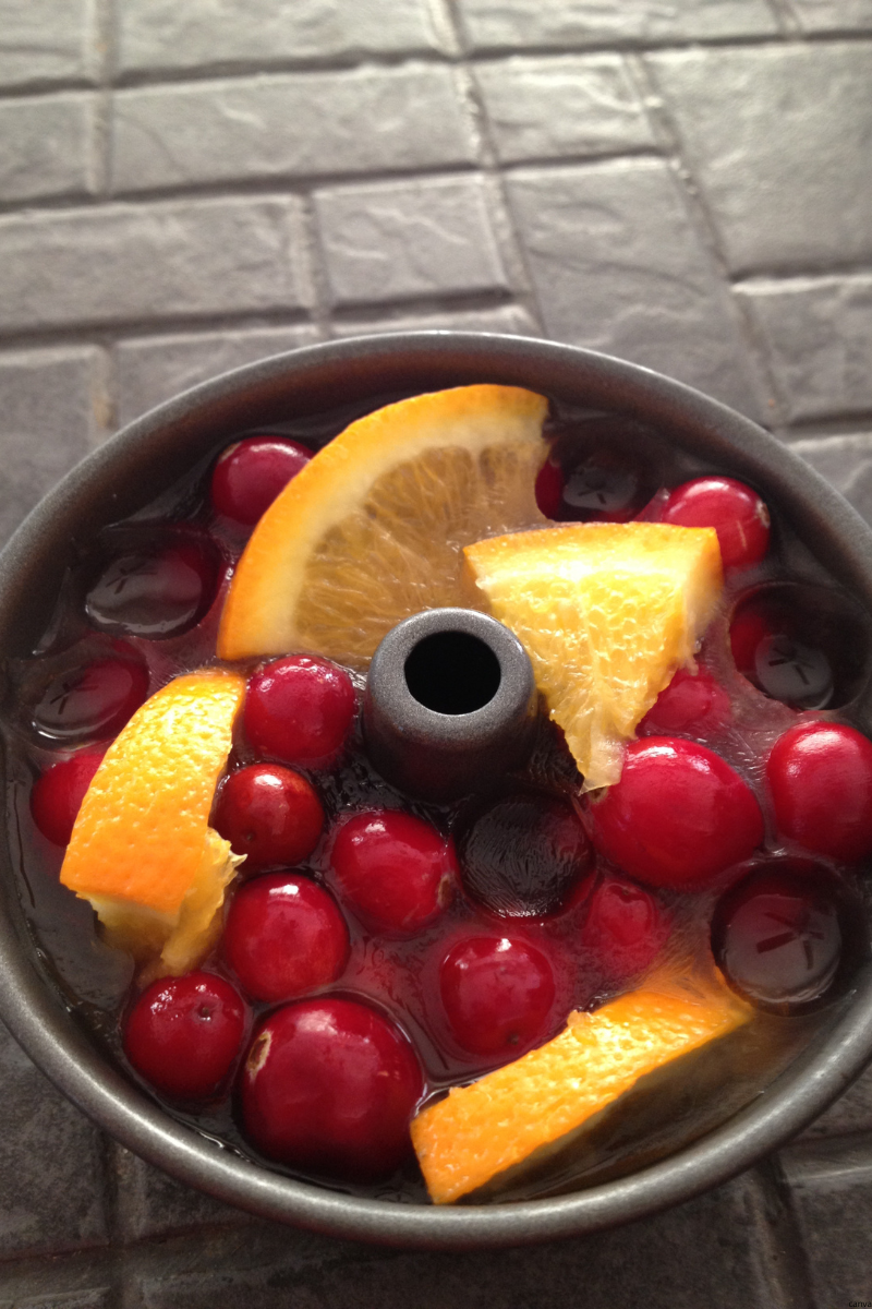 "Festive cranberry and orange ice ring for holiday punch – refreshing Christmas drink garnish idea"