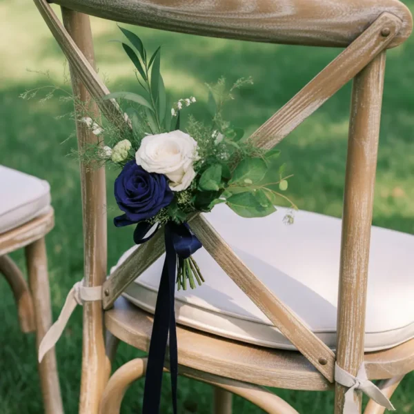 pew bunch wildflower decoration on wooden cross back chair