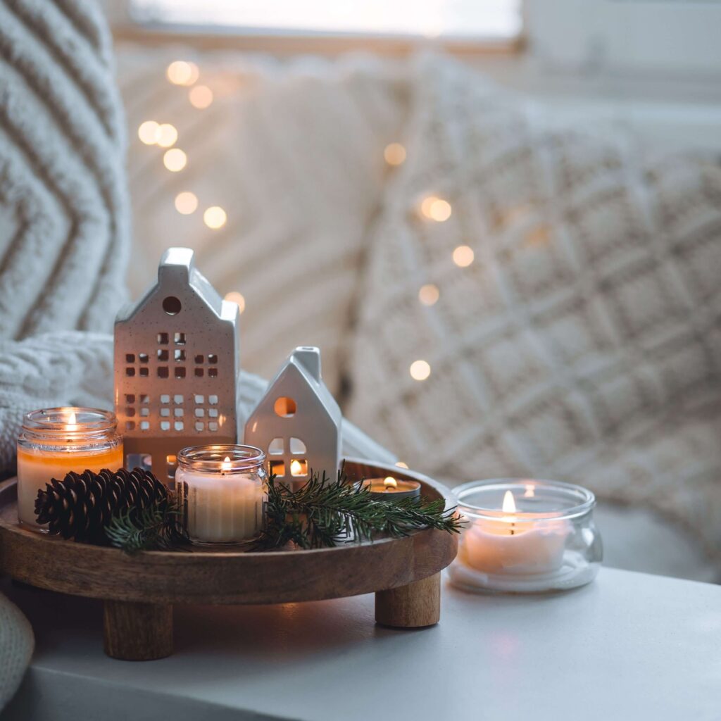Minimalist modern Christmas coffee table styling with white and gold accents