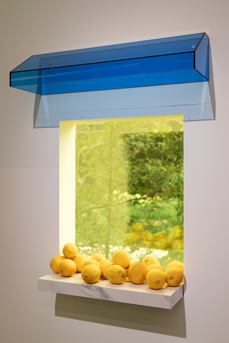 Lemons in blue ceramic bowl - citrus color palette inspiration