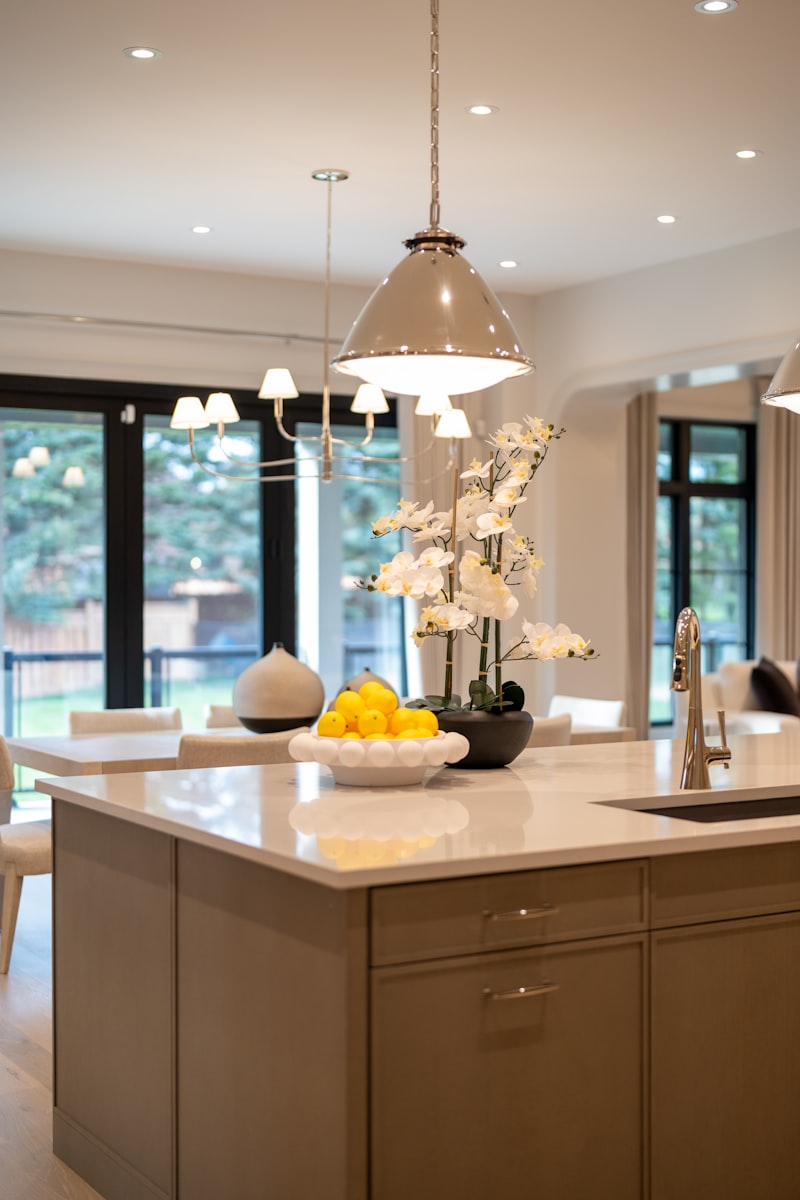 Lemon bowl on marble kitchen counter with ceramic bowls