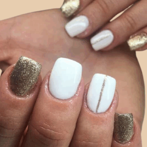 minimal white and gold Christmas nails 2025