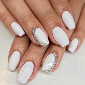 white Christmas nails 2025 with rhinestone accents